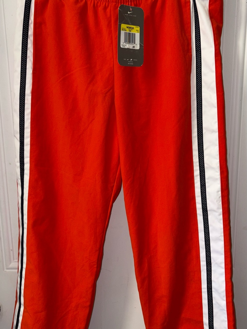 Cropped Nike Women's Red Track Pants with White & Black Side Stripes